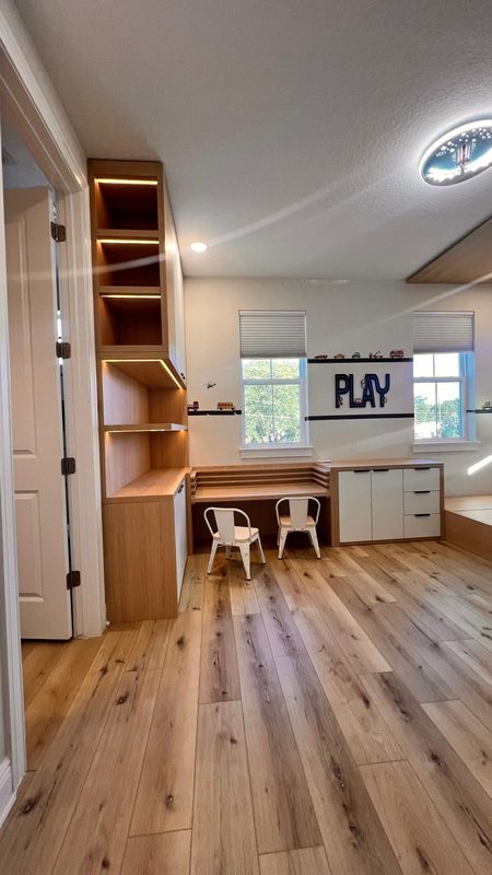 Sophisticated playroom with custom wooden shelving