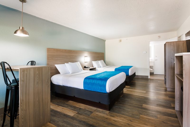 Modern hotel room with custom millwork