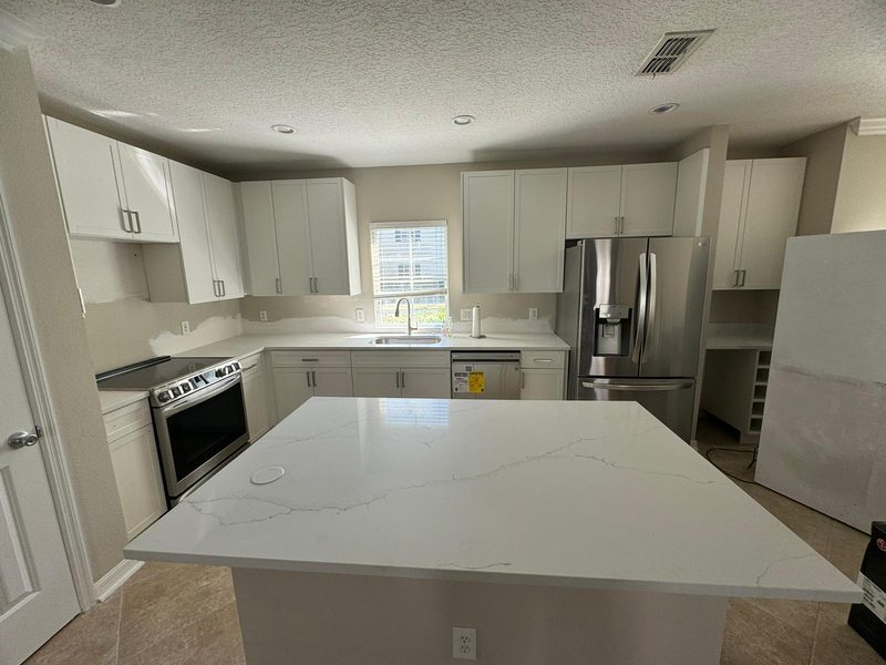 Modern kitchen with quartz island countertops