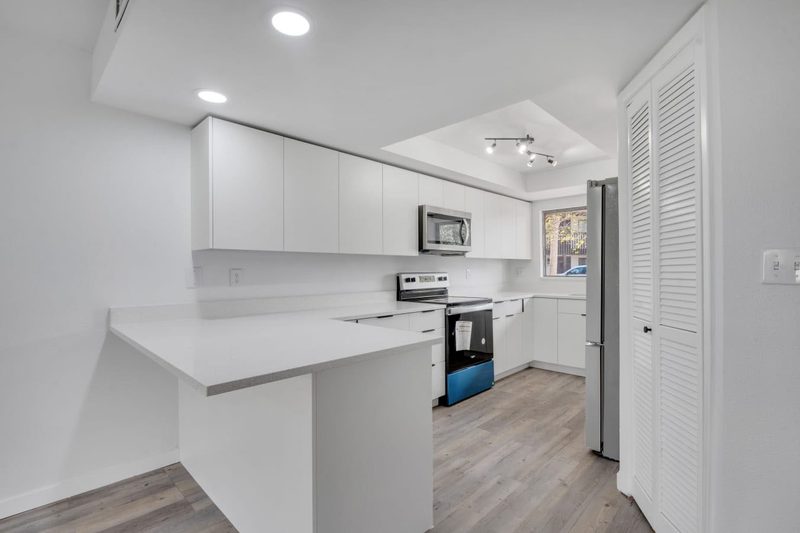 Modern kitchen with custom white cabinetry