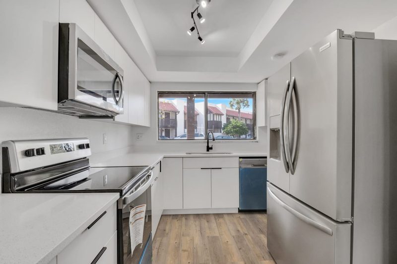 Modern kitchen with custom white cabinetry