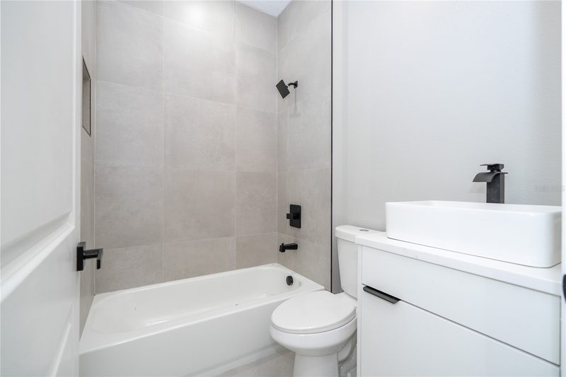Modern bathroom with frameless glass enclosure
