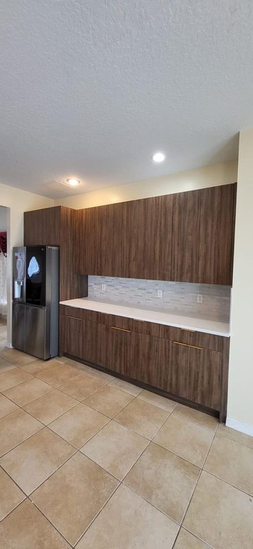 Contemporary kitchen with custom wood cabinetry