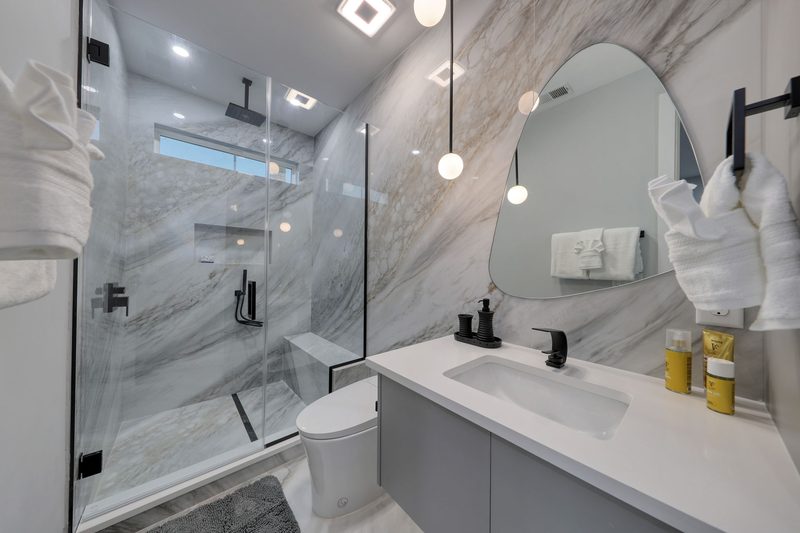 Elegant bathroom with natural stone finishes