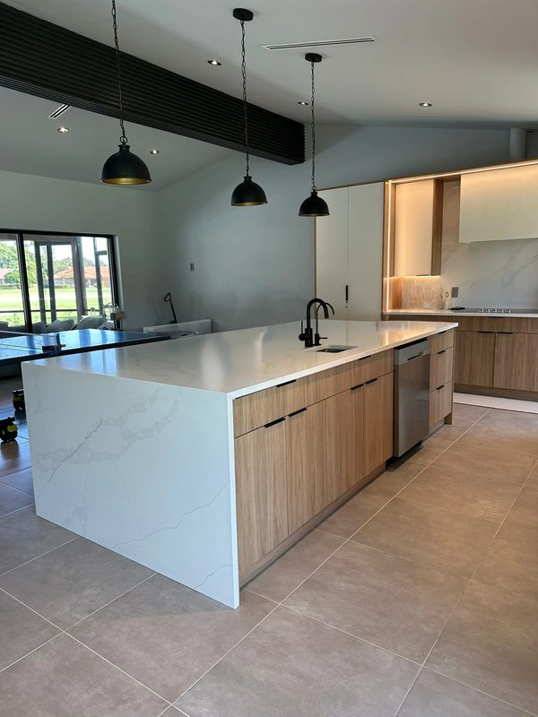 Contemporary kitchen with custom wood cabinetry