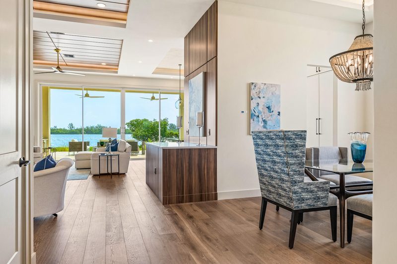 Coastal living space with walnut millwork