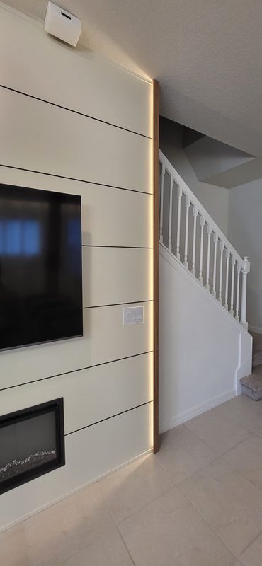 Contemporary living room with integrated media wall