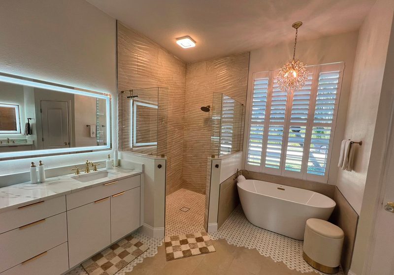 Elegant primary bathroom with spa features