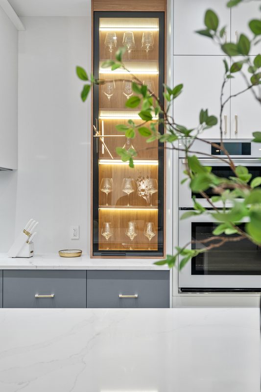 Modern kitchen with illuminated display cabinetry