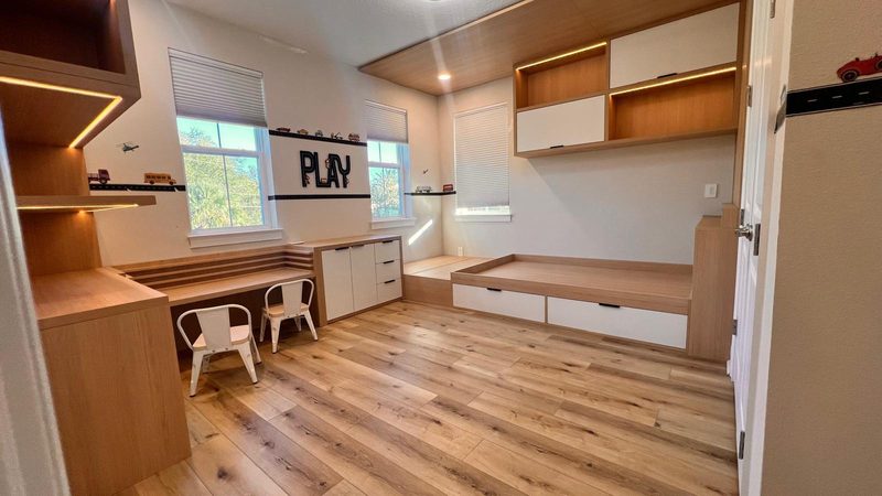Modern playroom with custom built-in cabinetry