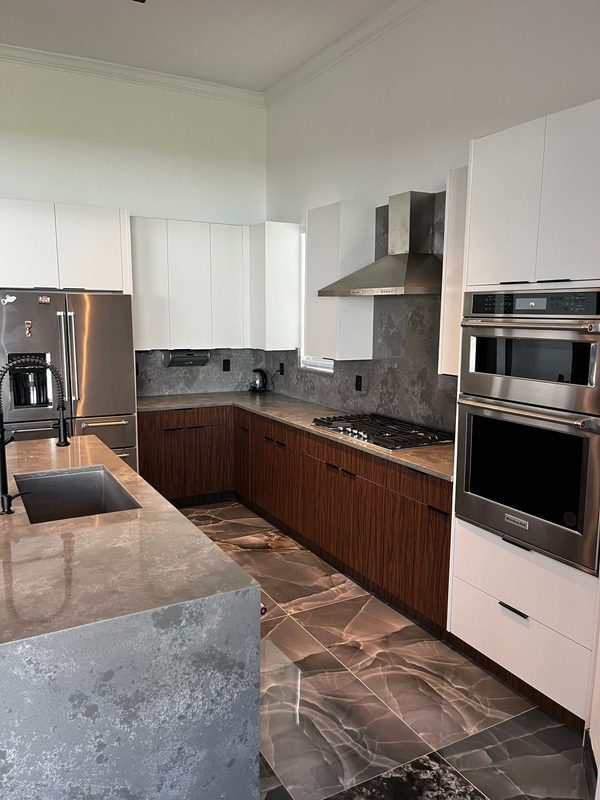 Contemporary kitchen with mixed-finish cabinetry