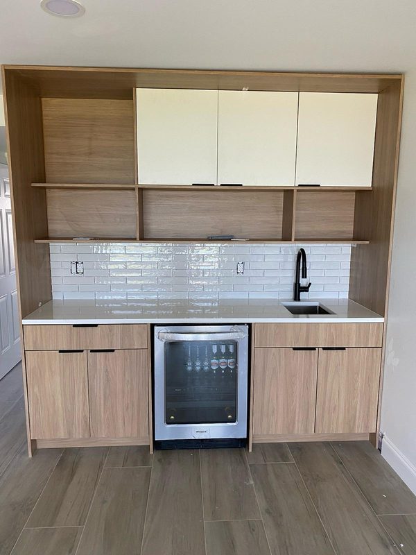 Modern wet bar with custom cabinetry
