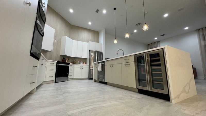 Contemporary Kitchen with Custom Cabinetry and Island