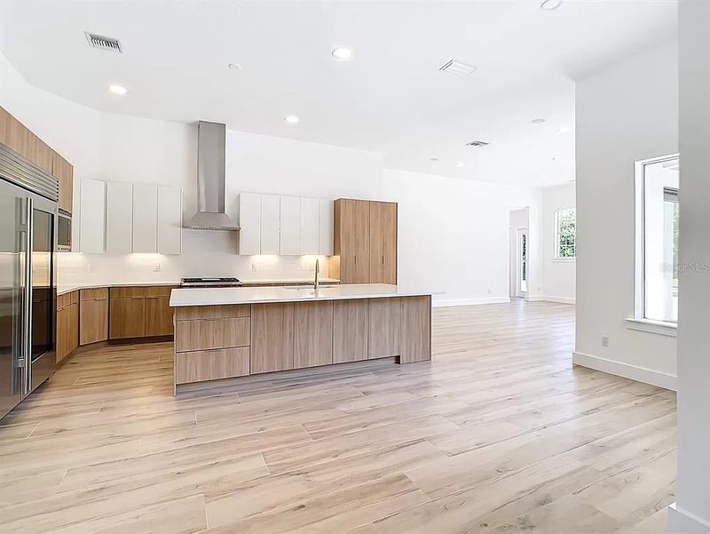 Contemporary kitchen with custom wood cabinetry