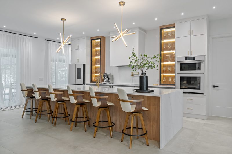 Contemporary kitchen with custom cabinetry and island