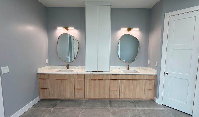 Luxe primary bathroom with dual vanity