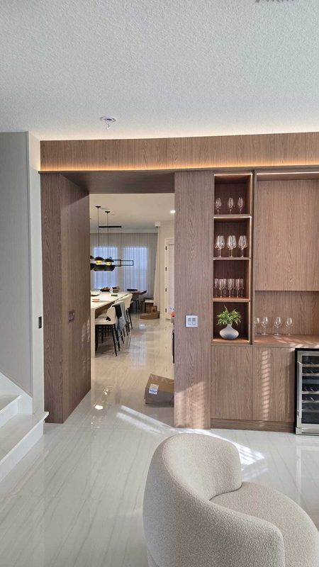 Sophisticated bar with custom wood cabinetry