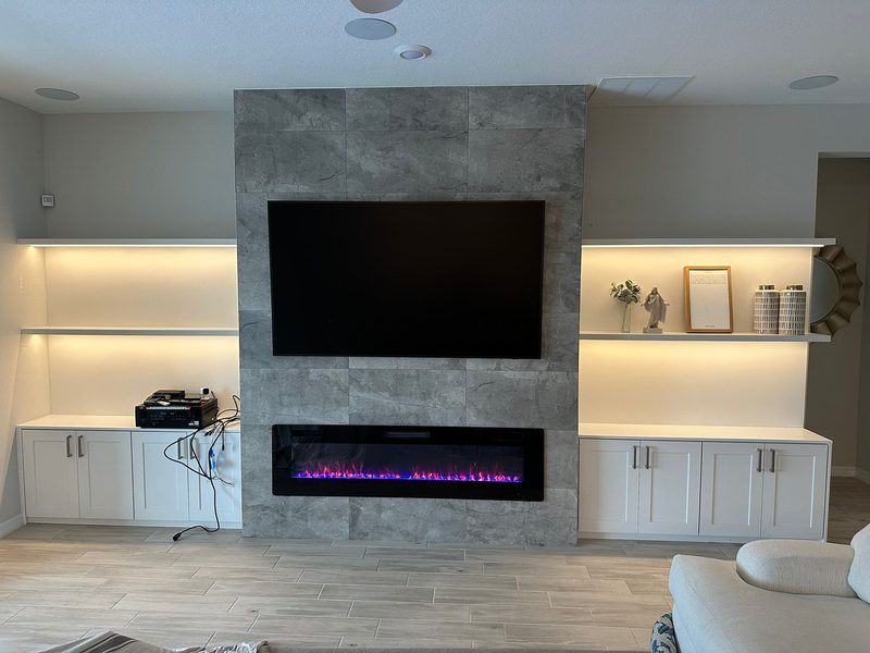 Modern living room with integrated fireplace wall