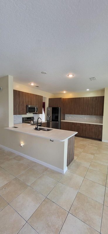 Contemporary Kitchen with Custom Wood Cabinetry