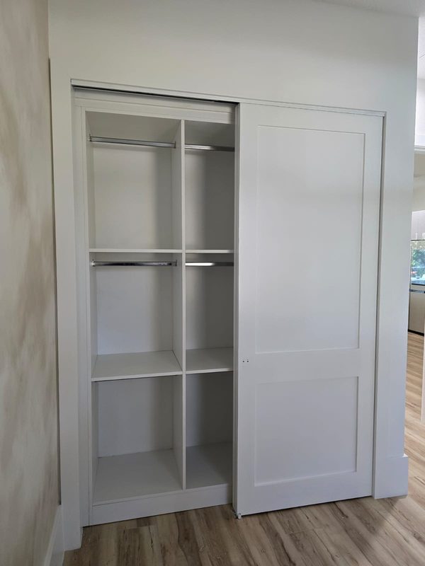 Upscale closet with custom built-in shelving