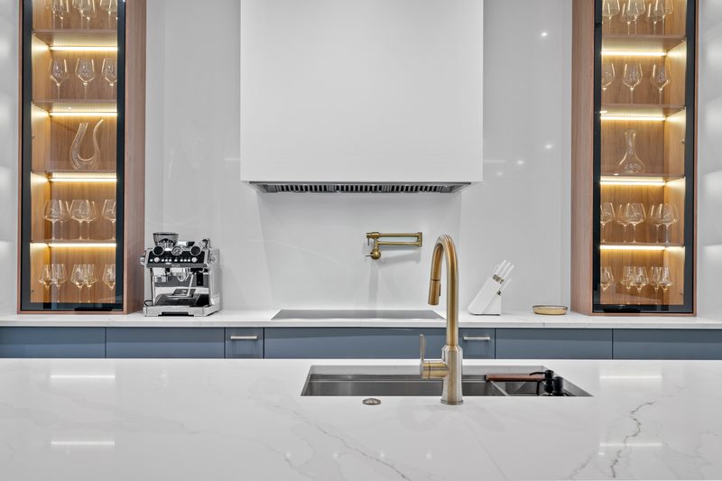 Contemporary Kitchen with Illuminated Display Cabinetry