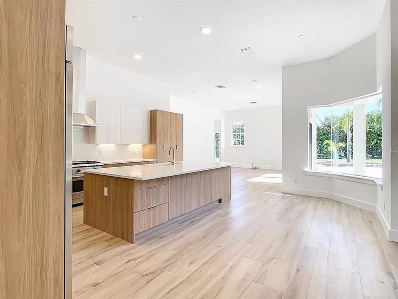 Contemporary kitchen with custom wood cabinetry