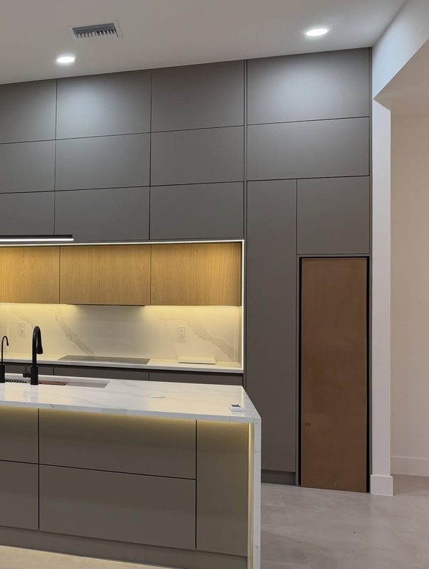 Modern kitchen with custom gray cabinetry