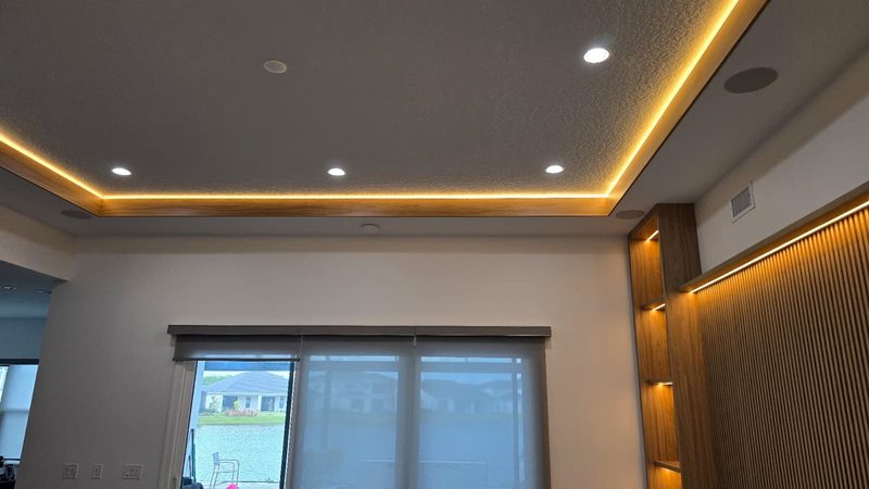 Modern living room with architectural ceiling lighting
