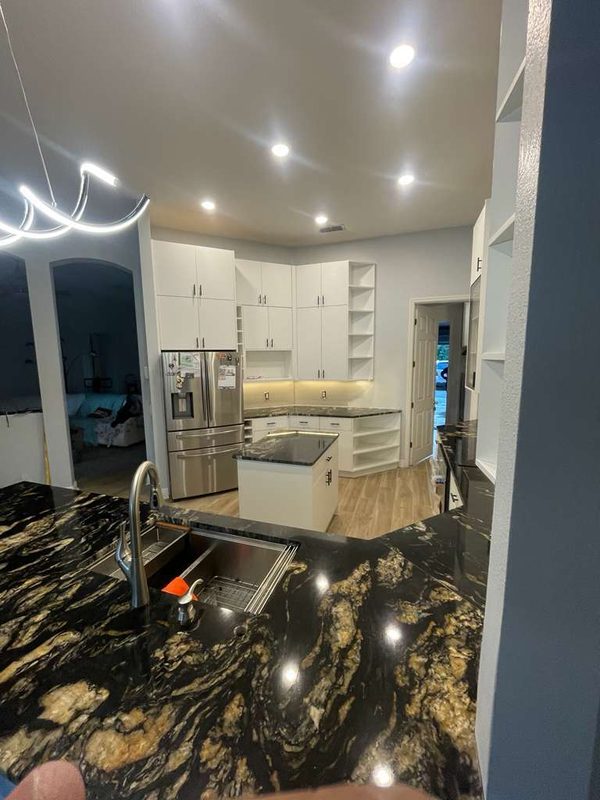 Luxury Kitchen with Custom White Cabinetry
