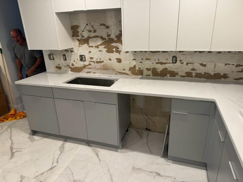 Custom Kitchen with Polished Waterfall Countertops