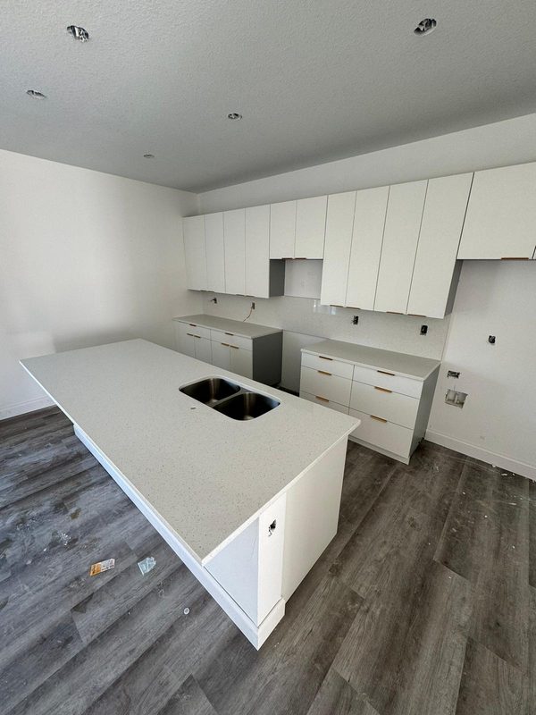 Modern kitchen with custom white cabinetry