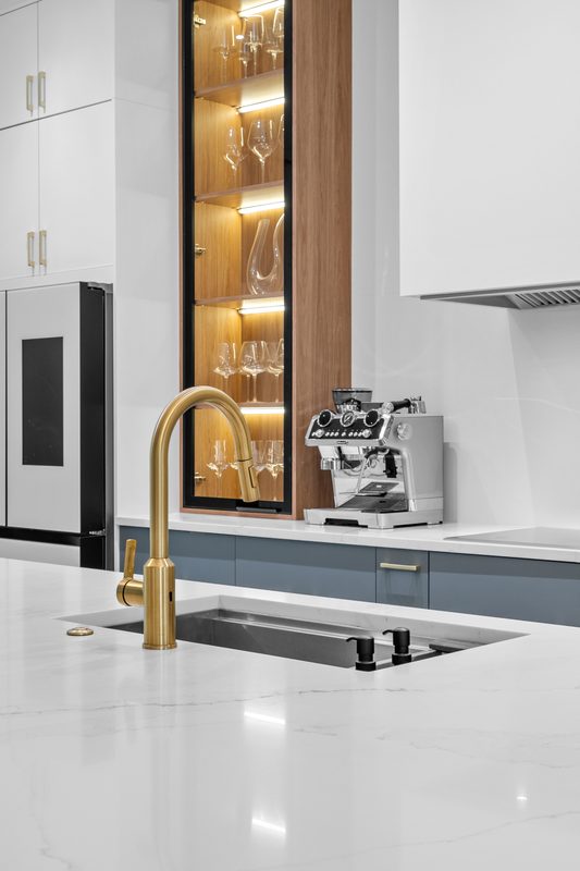 Contemporary Kitchen with Illuminated Glass Cabinetry