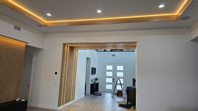 Modern entryway with ambient ceiling lighting