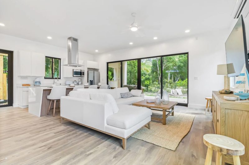 Serene coastal living room with garden views
