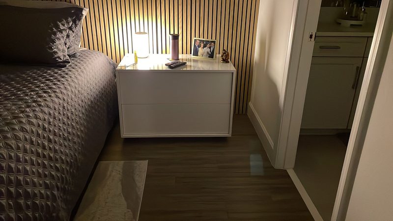 Modern bedroom with custom nightstand cabinetry