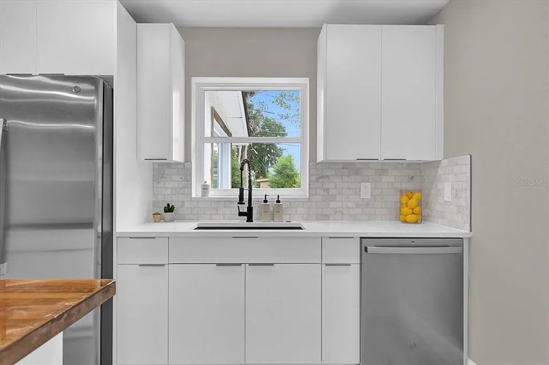 Modern kitchen with subway tile backsplash