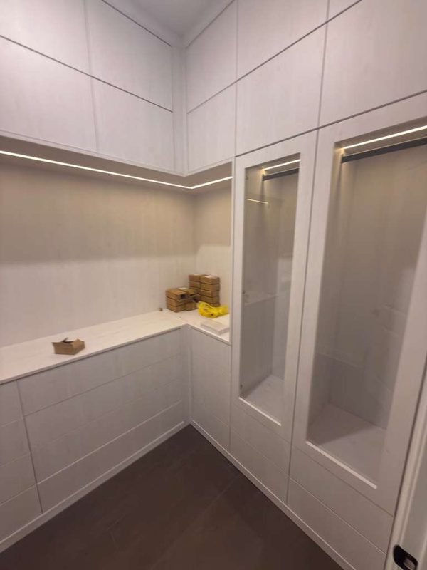 Luxury walk-in closet with integrated shelving