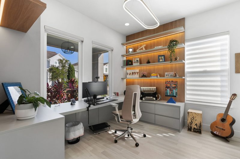Modern home office with custom wall shelving