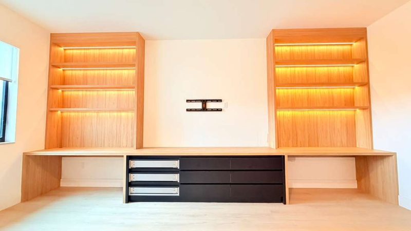 Warm living room with integrated millwork