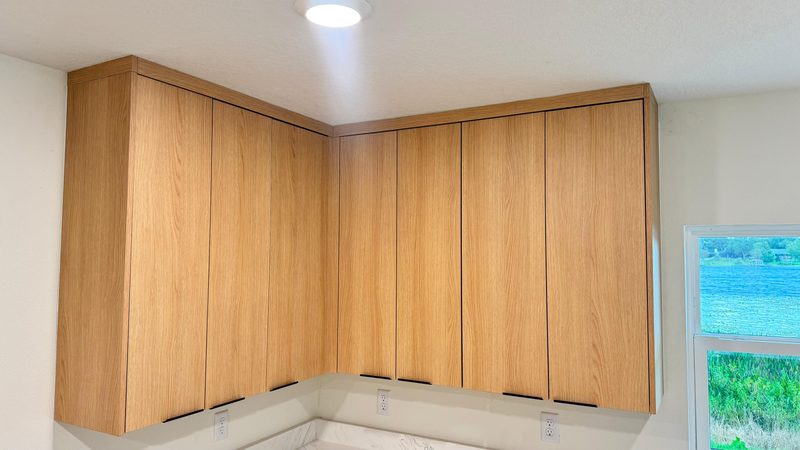 Custom kitchen with warm wood cabinetry