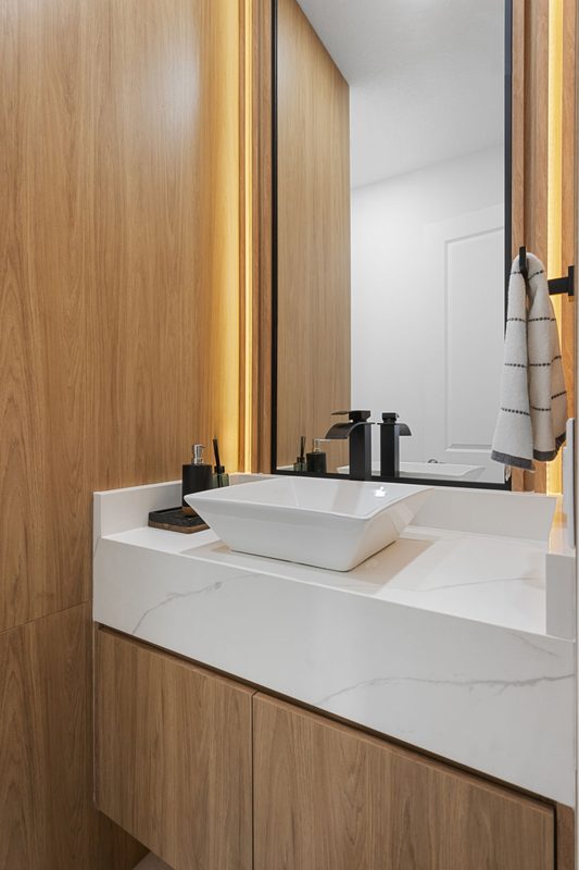 Elegant bathroom with warm wood accents