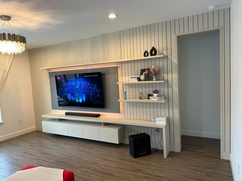 Sophisticated media room with integrated shelving