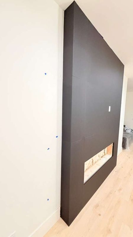Modern accent wall with integrated fireplace niche