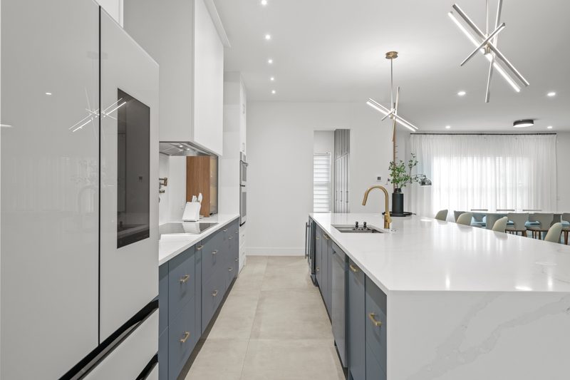 Contemporary Kitchen with Custom Gray Cabinetry