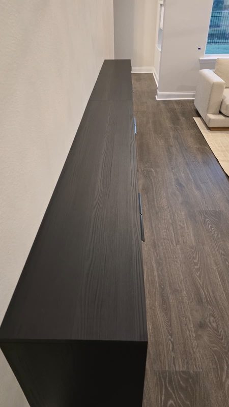 Modern hallway with custom dark cabinetry