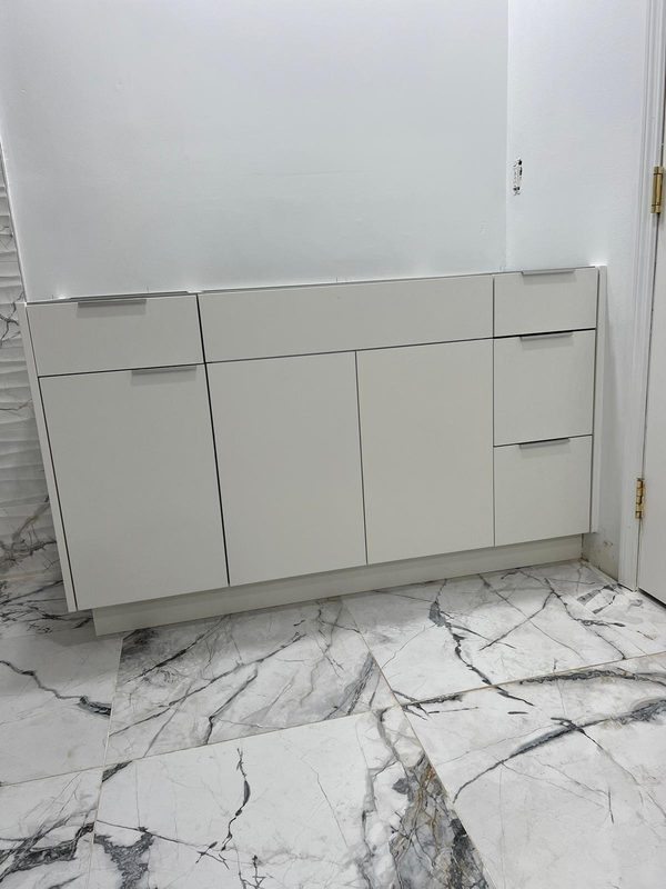 Elegant bathroom vanity with marble flooring