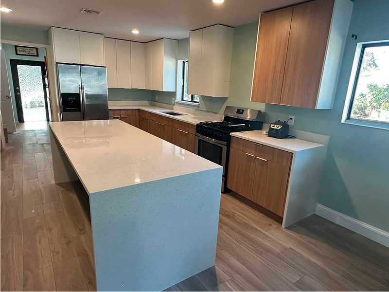 Contemporary kitchen with custom two-tone cabinetry