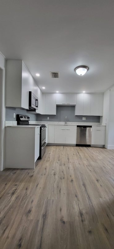 Contemporary Kitchen with Custom White Cabinetry