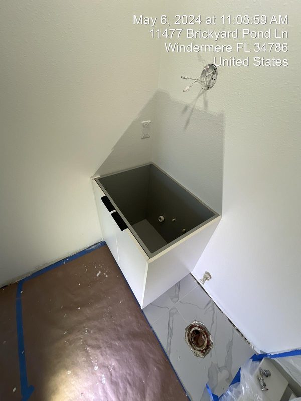 Custom utility room with integrated storage