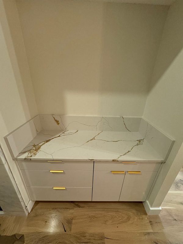 Custom kitchen with marble countertop
